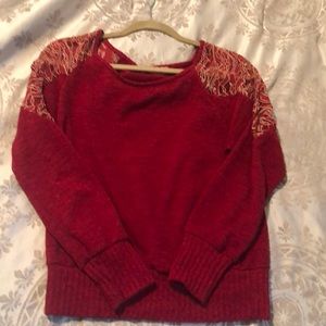 Red sweater with gold sequin and threading detail